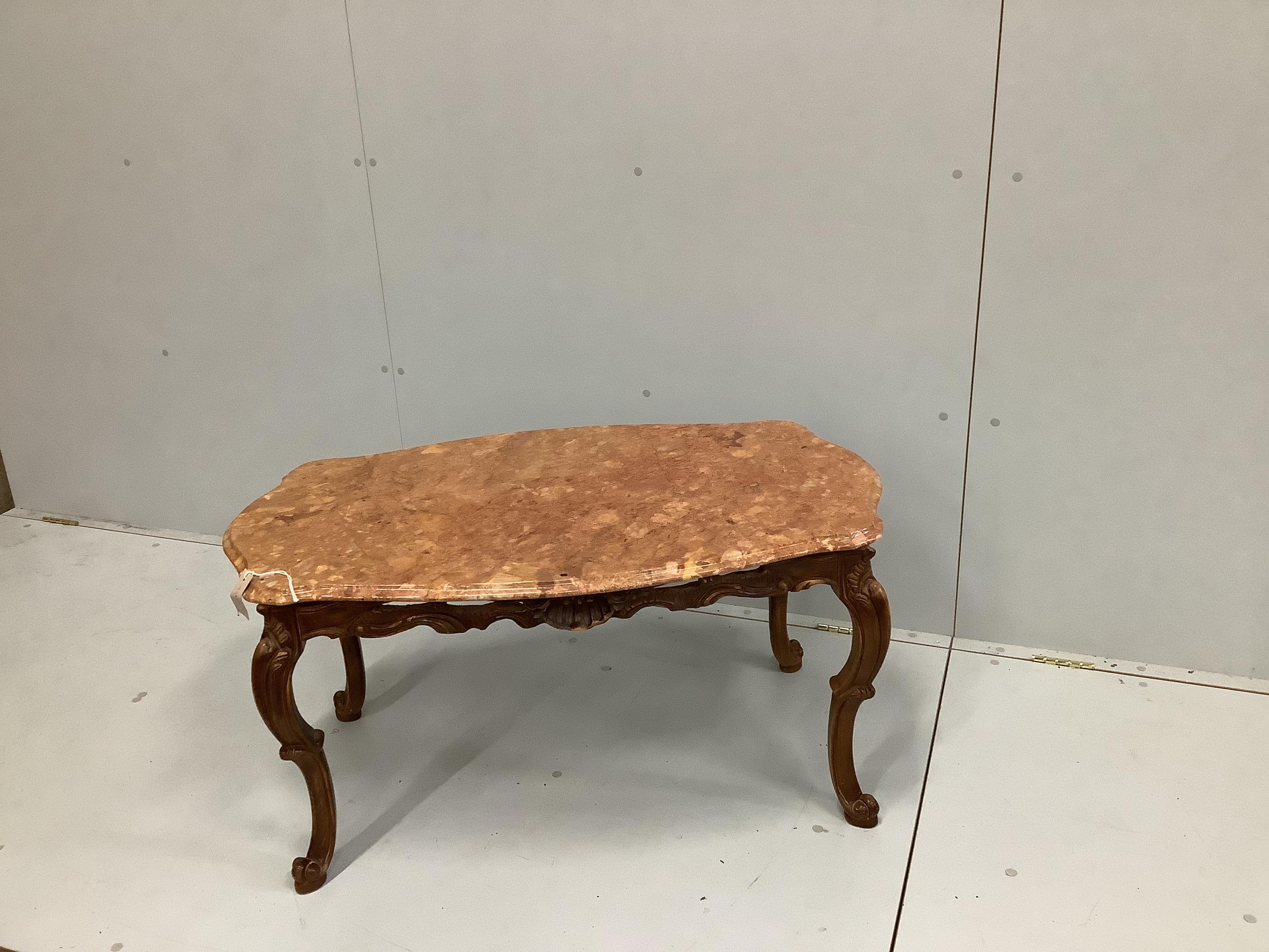 A rectangular coffee table, with shaped and moulded 'Rosso Verona' marble top, on carved cabriole legs, width 100cm, depth 60cm, height 49cm